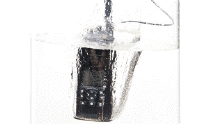 Two-way radio submerged in water, demonstrating its waterproof capability and durability.
