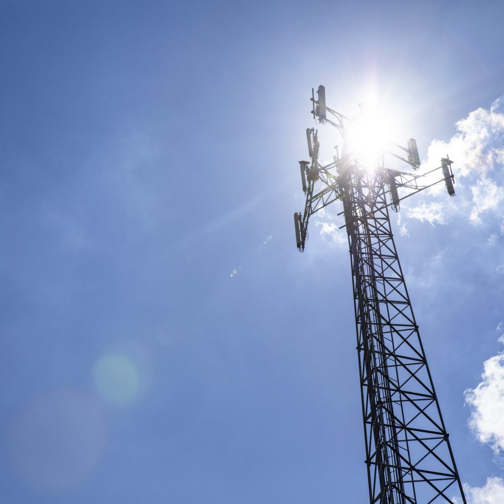 Cell phone towers reach to the sky